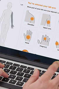 Close up of a computer screen showing a person using WorkSafeBC’s online reporting tool